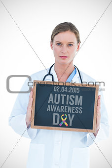 Composite image of doctor showing chalkboard