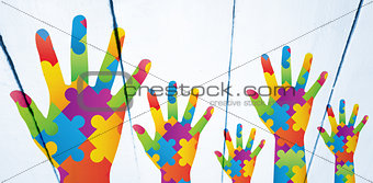 Composite image of autism awareness hand