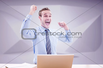 Composite image of businessman cheering