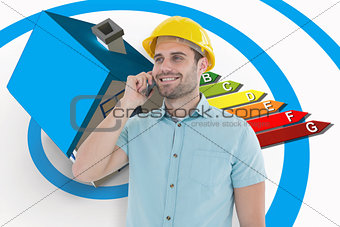 Composite image of happy male architect conversing on mobile phone