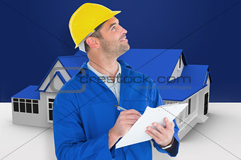 Composite image of male supervisor looking up while writing on clipboard