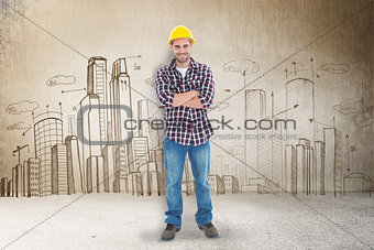 Composite image of handome male handyman standing arms crossed