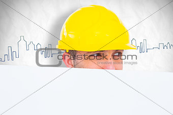 Composite image of handyman hidden behind blank board