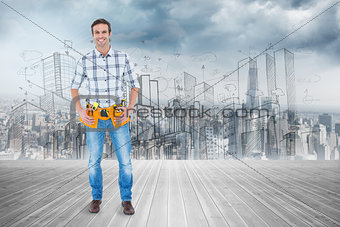 Composite image of repairman with tool belt around waist