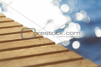 Blue sea and wooden pier