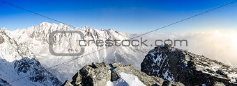 Panoramic scenic view of winter mountains in High Tatras, Slovak