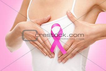 Woman with a breast cancer awareness ribbon