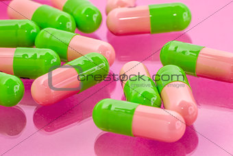 pink and green pills