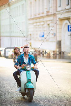 On a scooter