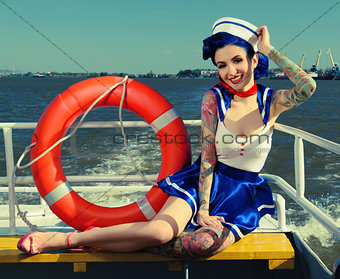 Pin-up girl sailor on the ship