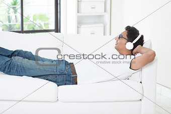 Indian male enjoying music