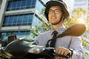 Chinese Businessman Commuter With Scooter Motorcycle In The Morn