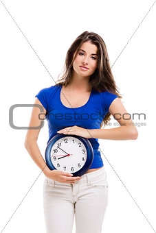 Beautiful woman with a clock
