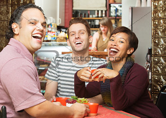 Laughing Group in Cafe