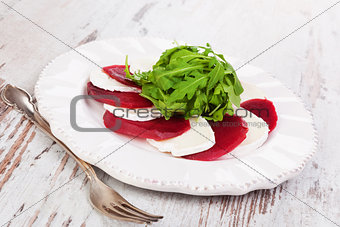 Beet with goat cheese, gourmet culinary eating. 