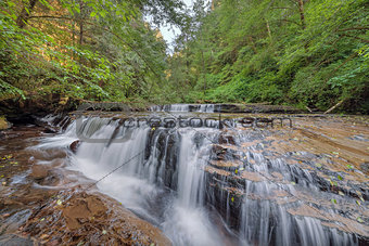 Tiered Cascading Waterfall over Ledge at Sweet Creek Falls Trail