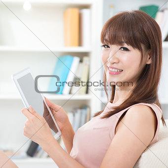 Asian girl using tablet pc