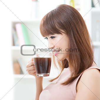 Asian girl drinking coffee
