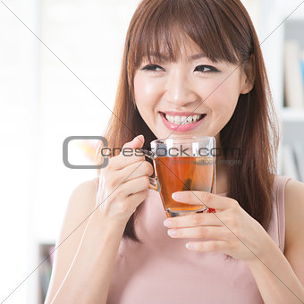 Asian girl drinking tea