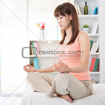 Asian girl meditating