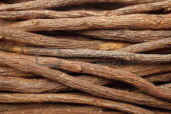 Liquorice root pieces background