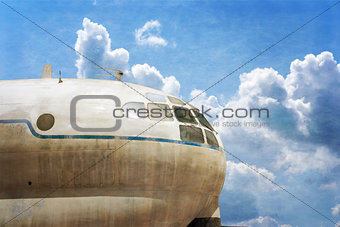 Military transport plane, blue sky background