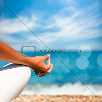 Yoga Hand on Sea Background