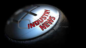Industry News on Gear Stick with Red Text.