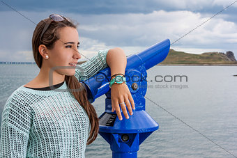 Beautiful teenager at the harbour