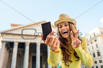 Closeup of digital camera and woman taking selfie at Pantheon