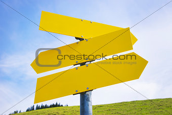 Three yellow empty arrow signs 