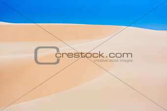 White sand dunes with blue skies, Mui Ne, Vietnam
