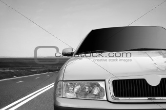 Fast car on the highway.closeup