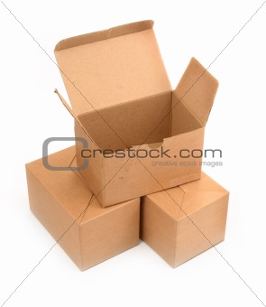three cardboard boxes on white