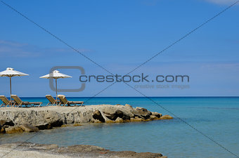 Crystalline Mediterranean Sea on a white sand beach
