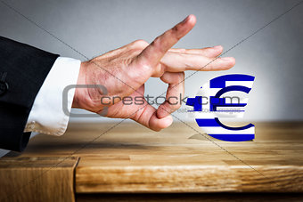 Man shoots greek Euro sign off