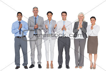 Smiling business people applauding
