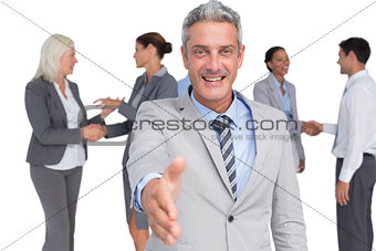 businessman offering handshake