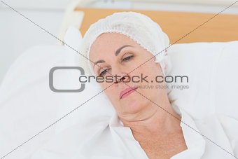 patient resting in the bed