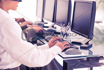 Business people using computers