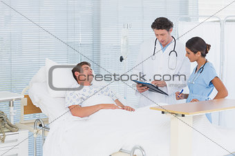 Doctors taking care of patient