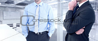Composite image of frowning businessman thinking