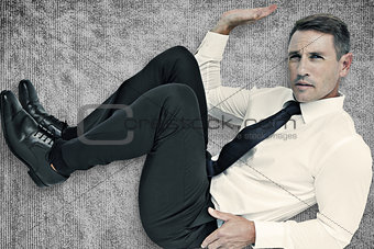 Composite image of trapped businessman