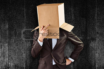Composite image of anonymous businessman touching his chin