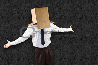 Composite image of anonymous businessman with arms out