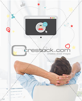 Composite image of rear view of a casual man resting with hands behind head in office
