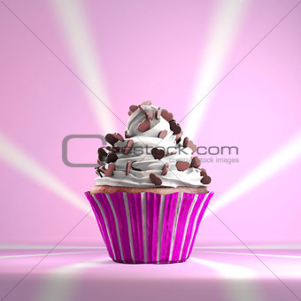 Delicious cupcake with chocolate hearts on a whipped cream.