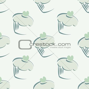 Seamless vector pattern with cupcakes on mint green background.