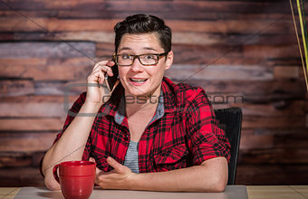 Happy Lesbian in Red Shirt on Phone