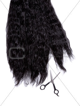 Long black curly hair with professional scissors 